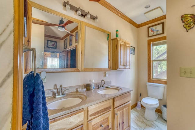 bathroom featuring crown molding, tile patterned flooring, vanity, and toilet