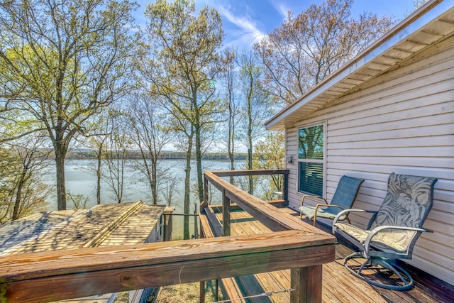 wooden terrace with a water view