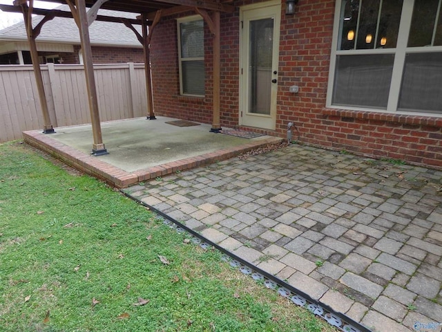  - view of patio with fence