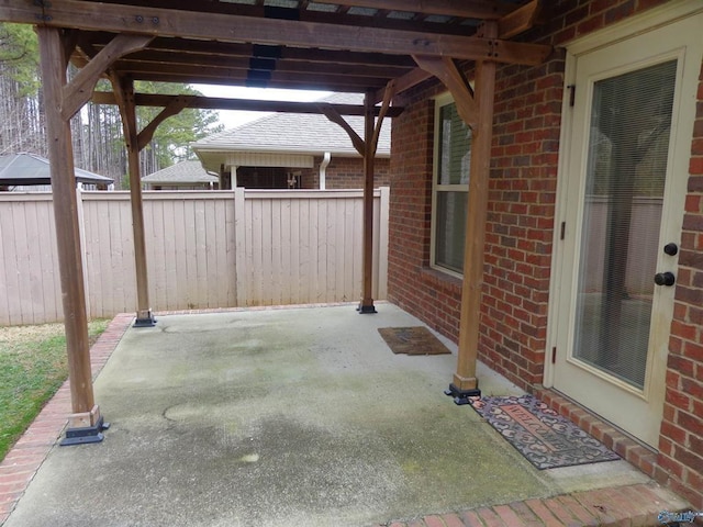  - view of patio / terrace featuring fence