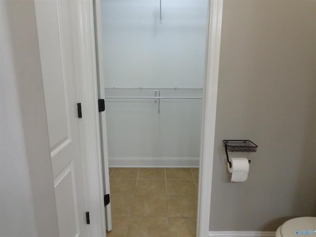  - spacious closet featuring light tile patterned floors