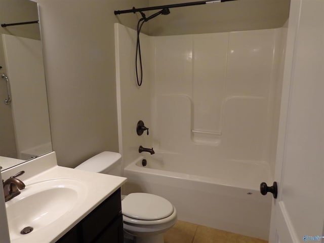  - bathroom with tile patterned floors, toilet, vanity, and washtub / shower combination