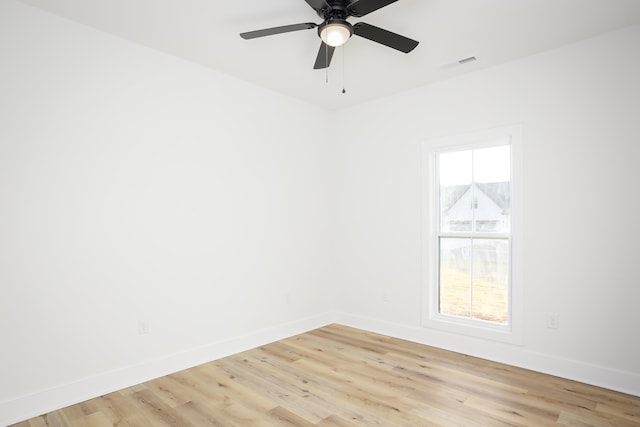 unfurnished room with ceiling fan and light hardwood / wood-style flooring