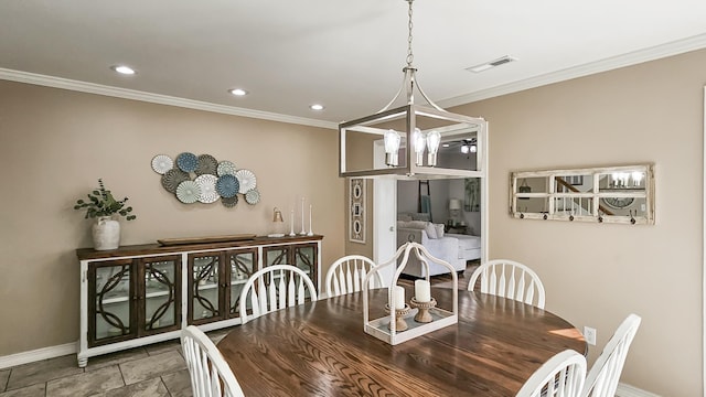 tiled dining room featuring recessed lighting, visible vents, an inviting chandelier, ornamental molding, and baseboards