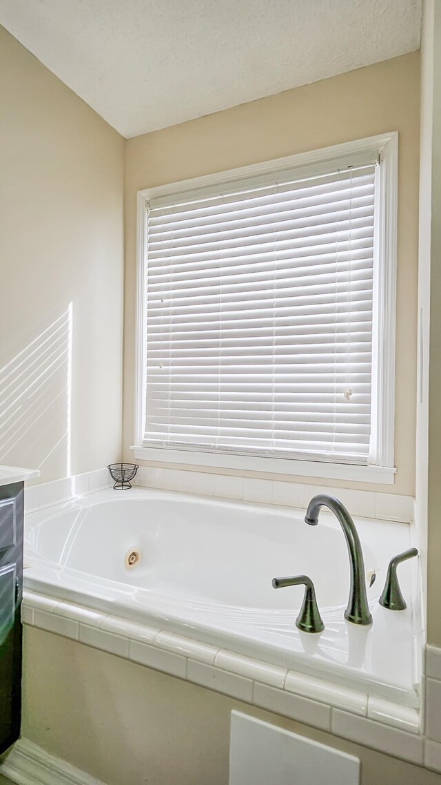 bathroom featuring a whirlpool tub