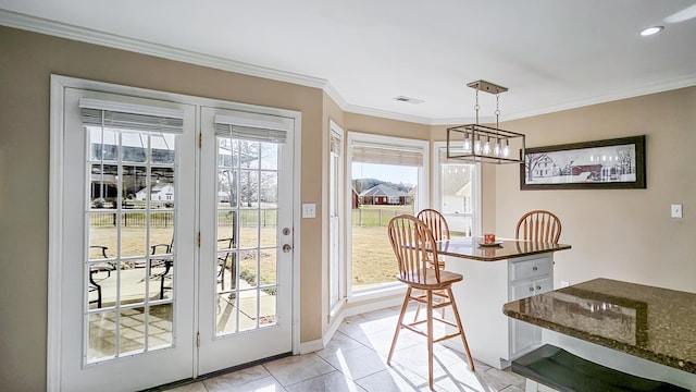 dining area with light tile patterned floors, recessed lighting, visible vents, ornamental molding, and baseboards