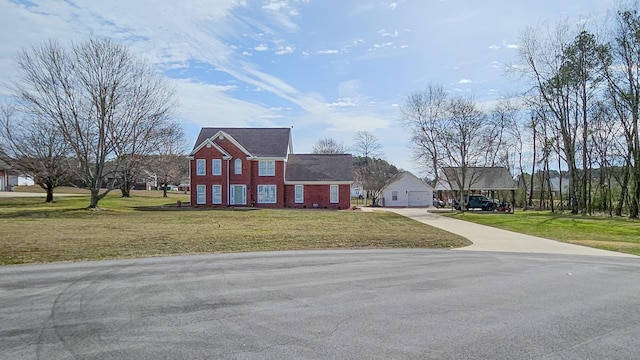 view of front facade with a garage and a front yard