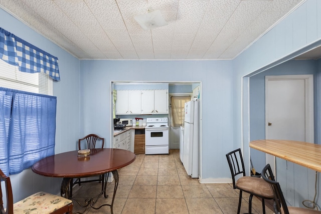 dining room featuring light tile patterned floors