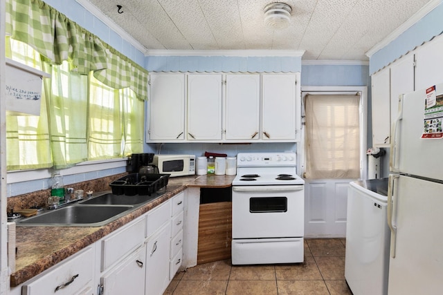 kitchen with white cabinets, sink, white appliances, and ornamental molding