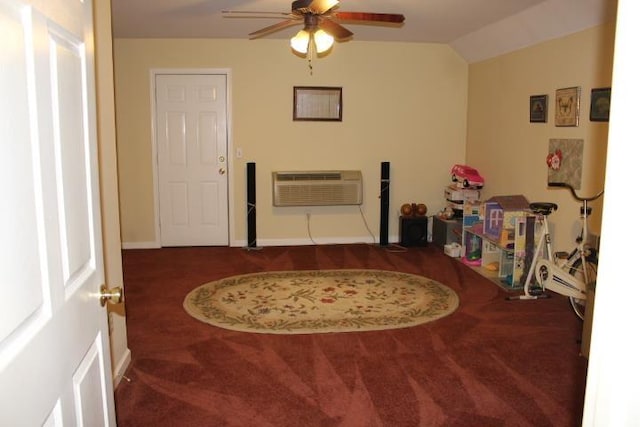 game room with carpet flooring, a wall mounted air conditioner, a ceiling fan, baseboards, and vaulted ceiling