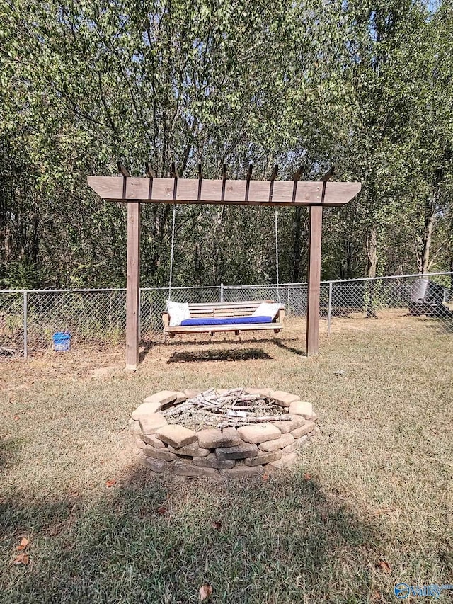 view of yard featuring a fire pit