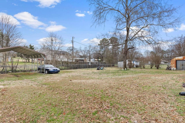 view of yard with a carport