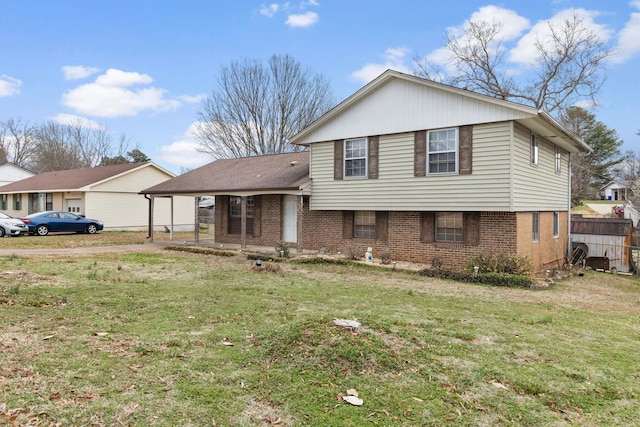 split level home featuring a front lawn