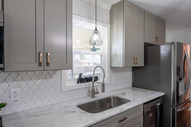 kitchen featuring sink, gray cabinets, light stone countertops, and appliances with stainless steel finishes