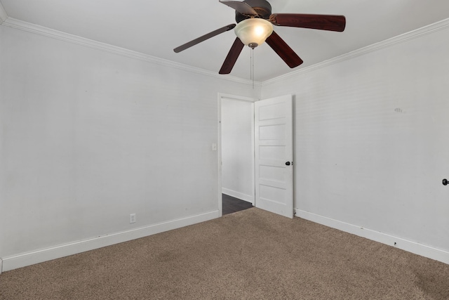 empty room with dark colored carpet, ornamental molding, and ceiling fan