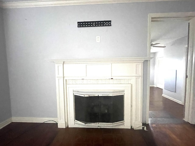 interior details featuring hardwood / wood-style floors, ceiling fan, and ornamental molding