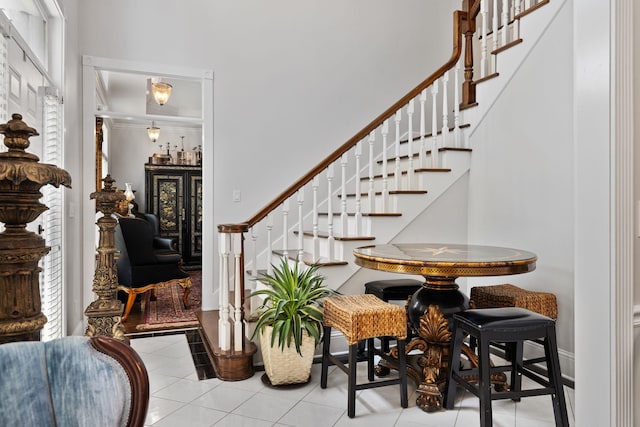 foyer featuring light tile patterned floors