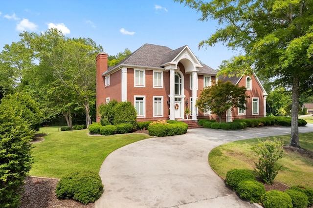 view of front of home with a front yard