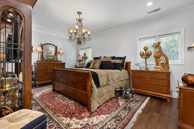 bedroom with a notable chandelier, dark hardwood / wood-style floors, crown molding, and multiple windows