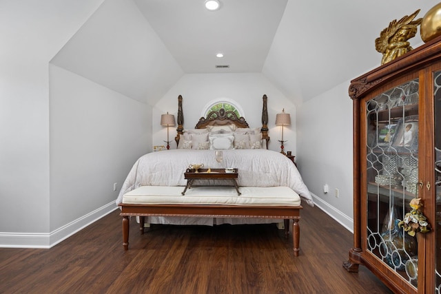 bedroom with hardwood / wood-style floors and vaulted ceiling