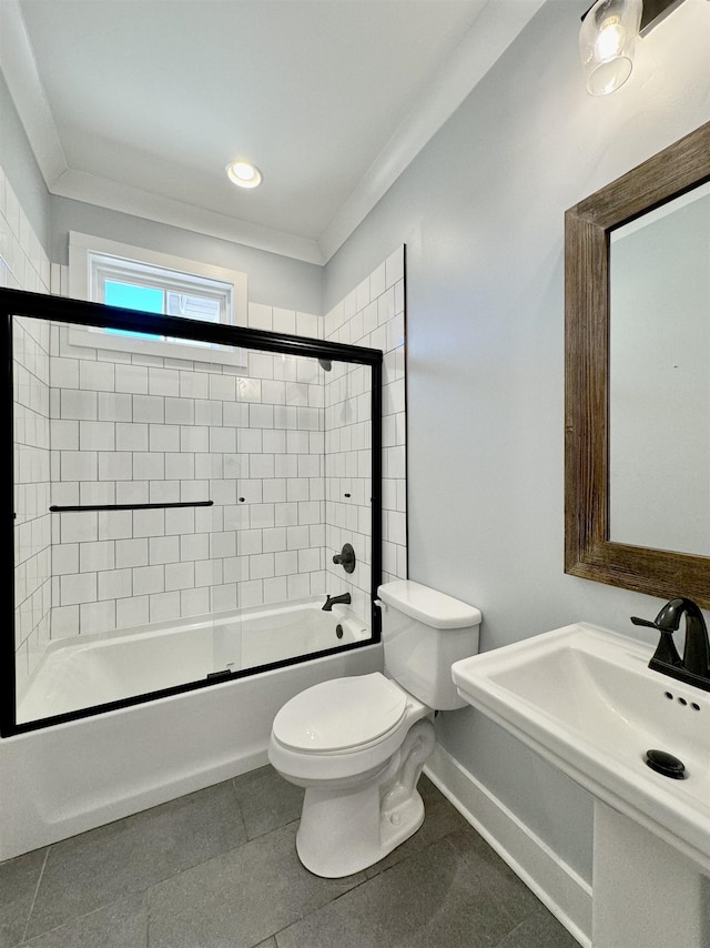 full bathroom with combined bath / shower with glass door, toilet, crown molding, and sink