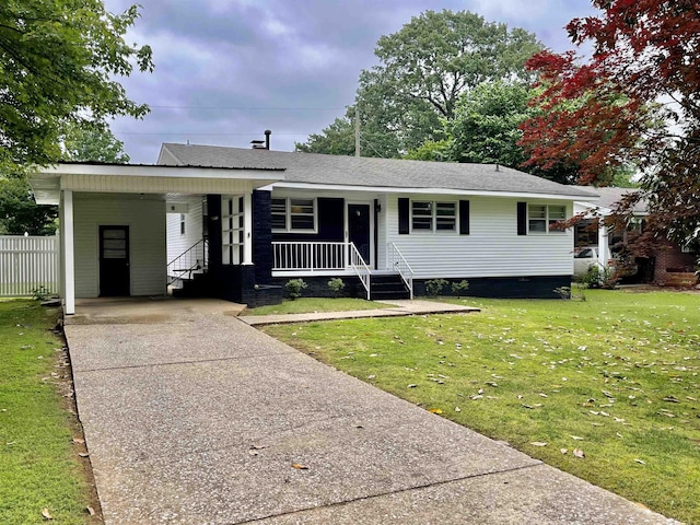 view of front of property featuring driveway, a porch, a carport, and a shingled roof