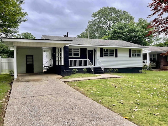 single story home featuring driveway, a porch, an attached carport, and roof with shingles