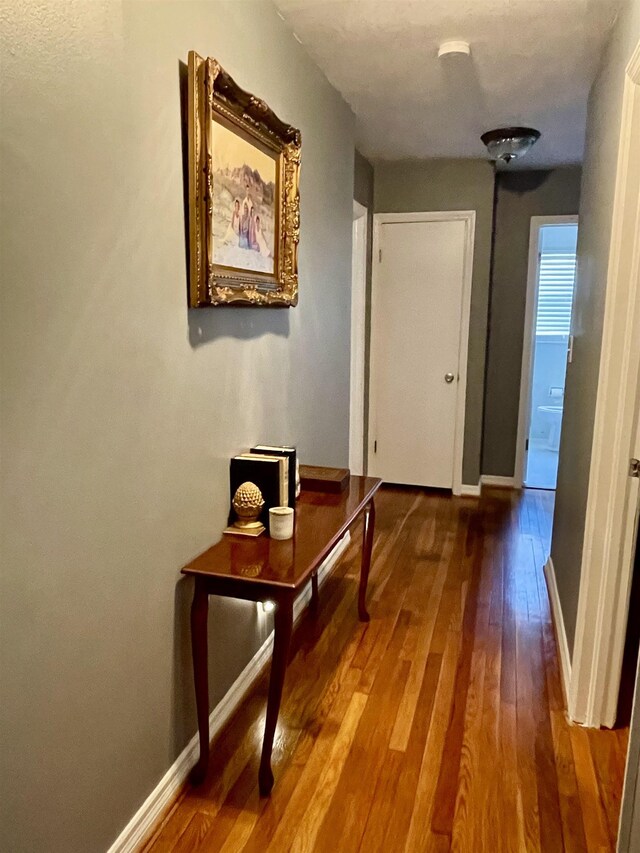bedroom with wood finished floors and a ceiling fan