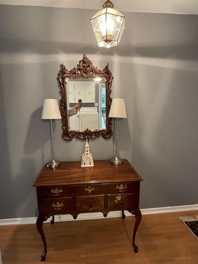 detailed view of wood finished floors and baseboards
