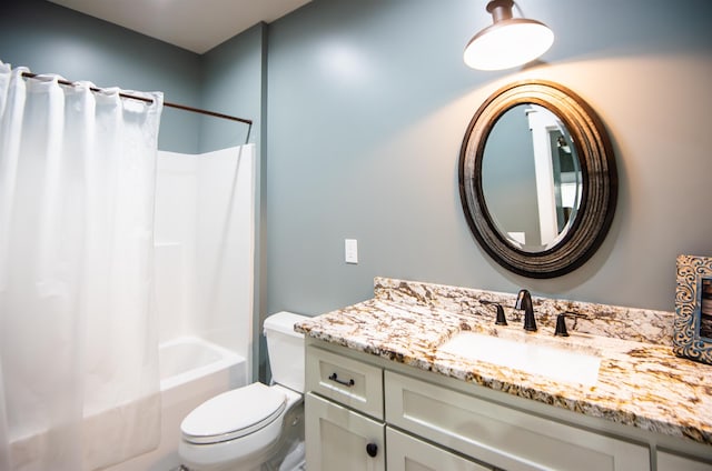 full bathroom featuring vanity, toilet, and shower / bath combo with shower curtain