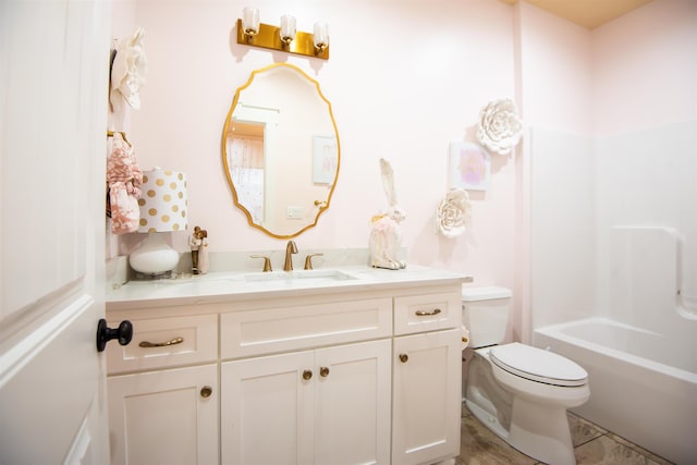 full bathroom with vanity, bathtub / shower combination, and toilet