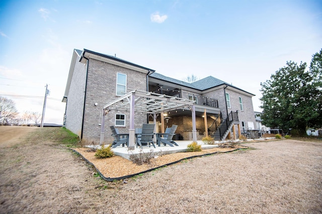 rear view of house with a patio