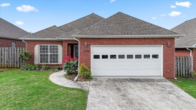 ranch-style home with brick siding, roof with shingles, concrete driveway, and a garage