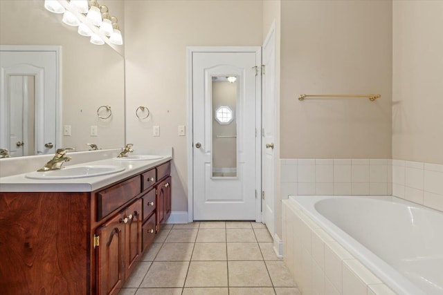 full bathroom with tile patterned flooring, a garden tub, and double vanity