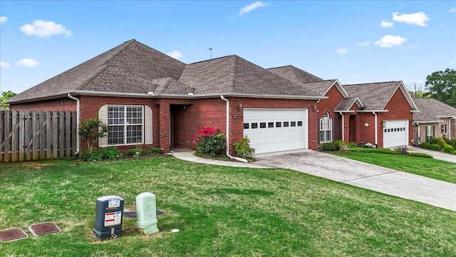 ranch-style house featuring brick siding, a garage, and driveway
