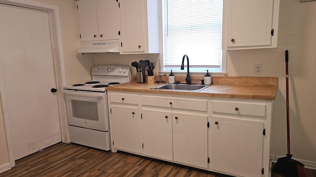 kitchen with dark hardwood / wood-style flooring, sink, white cabinets, and electric stove