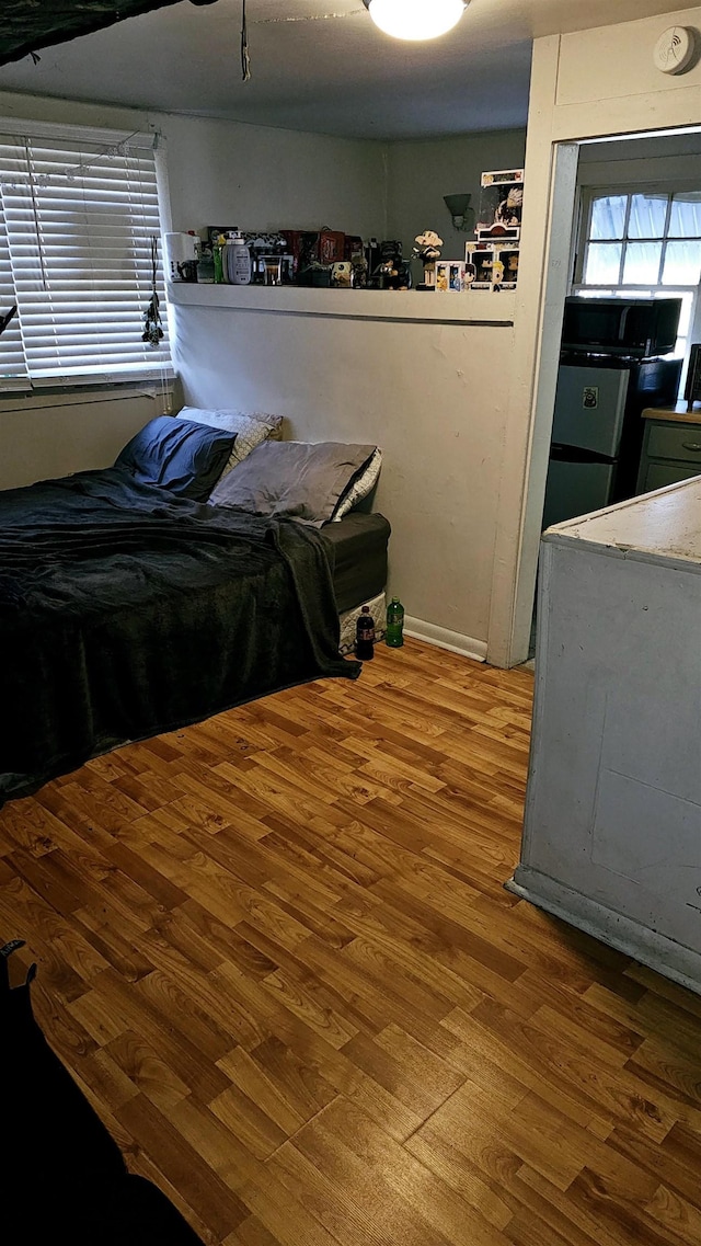 bedroom featuring wood-type flooring