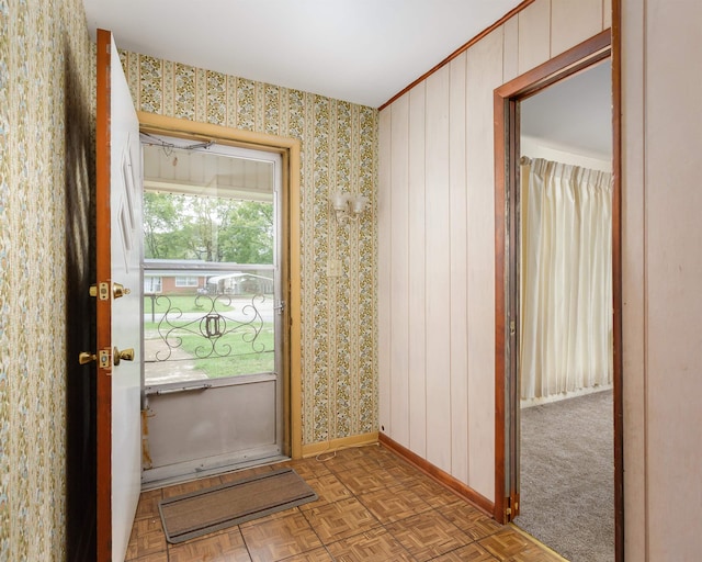 doorway with parquet flooring