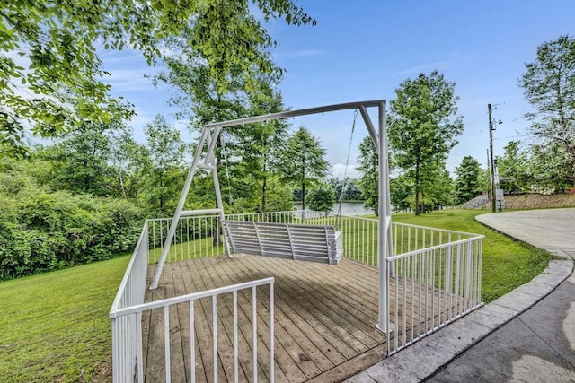 exterior space featuring a yard and a water view