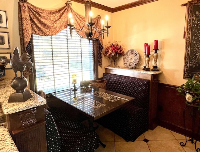 tiled dining room with ornamental molding