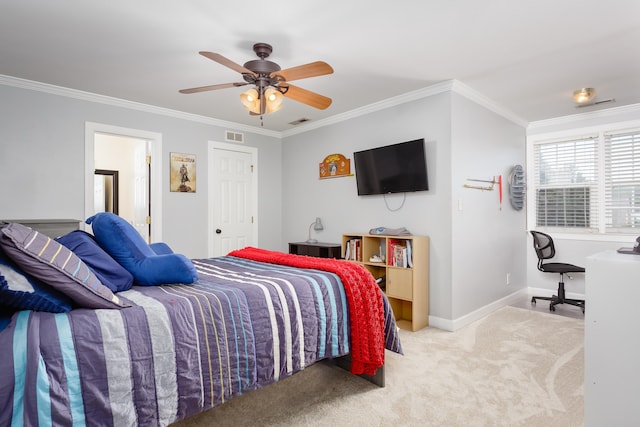 carpeted bedroom featuring visible vents, ornamental molding, and baseboards