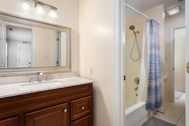 bathroom featuring shower / tub combo, visible vents, vanity, and tile patterned floors