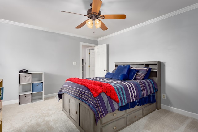 bedroom with carpet, baseboards, and crown molding