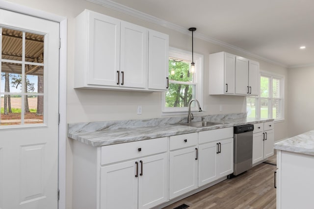 kitchen featuring white cabinets, a sink, light wood-style flooring, and dishwasher