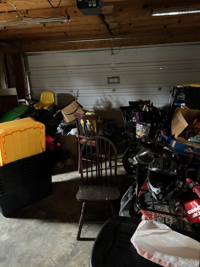 garage featuring a garage door opener