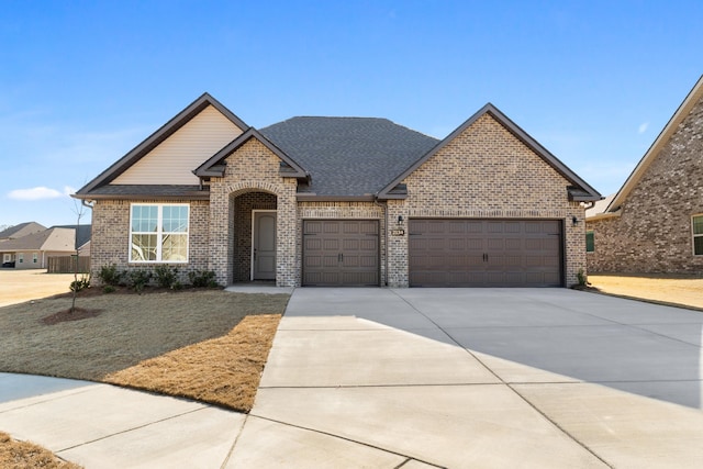 view of front of property featuring a garage