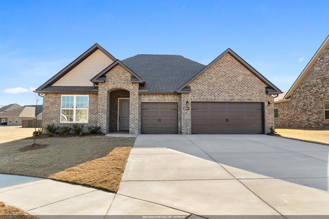 view of front of property with a garage