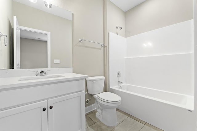 full bathroom featuring tile patterned flooring, vanity, bathing tub / shower combination, and toilet