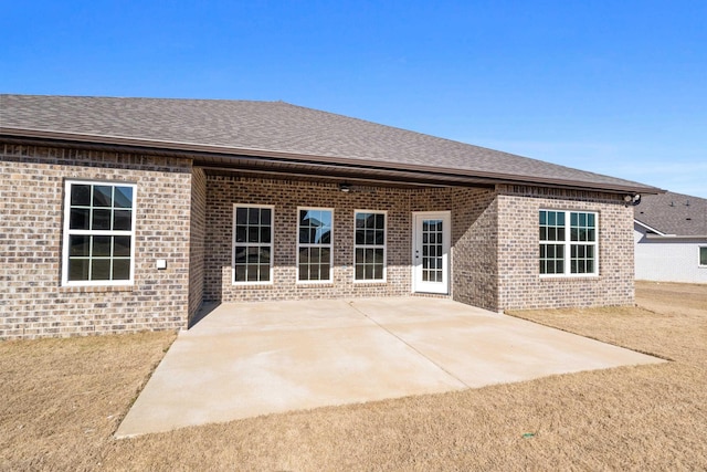 rear view of property featuring a patio