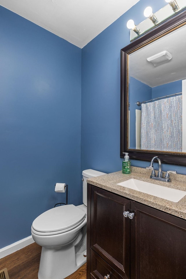  - full bathroom with vanity and wood finished floors
